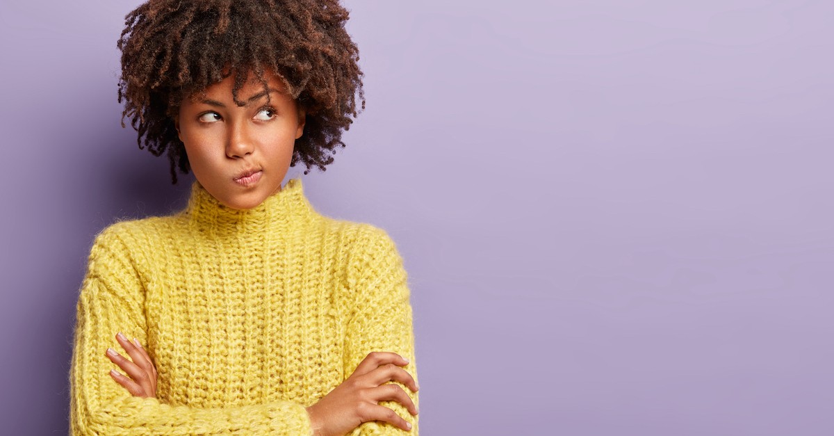 woman thinking purple background, what is an agnostic