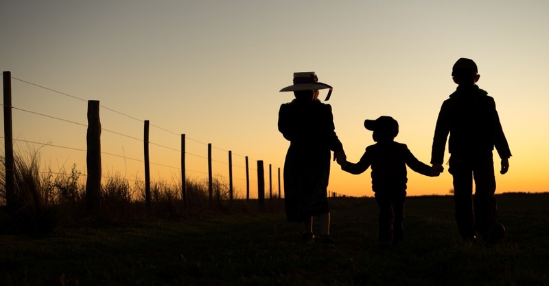 Mennonite children holding hands