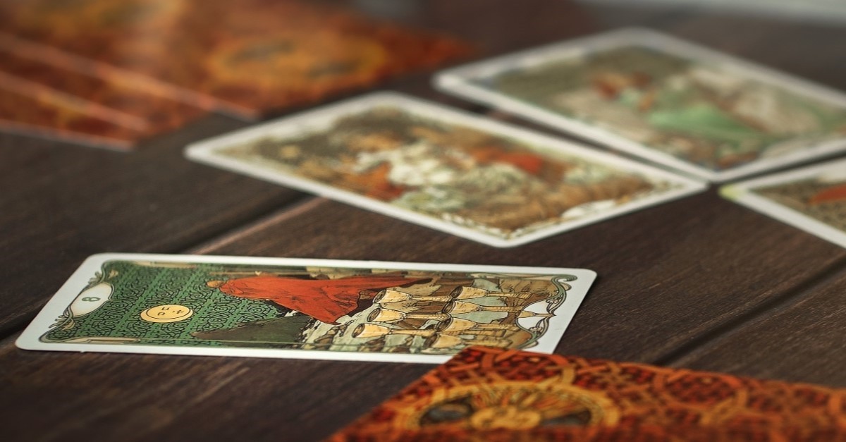 tarot cards spread out on table, where do tarot cards come from