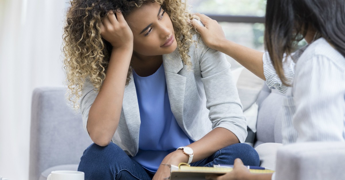 Young woman receiving counseling; what does the Bible say about counseling?